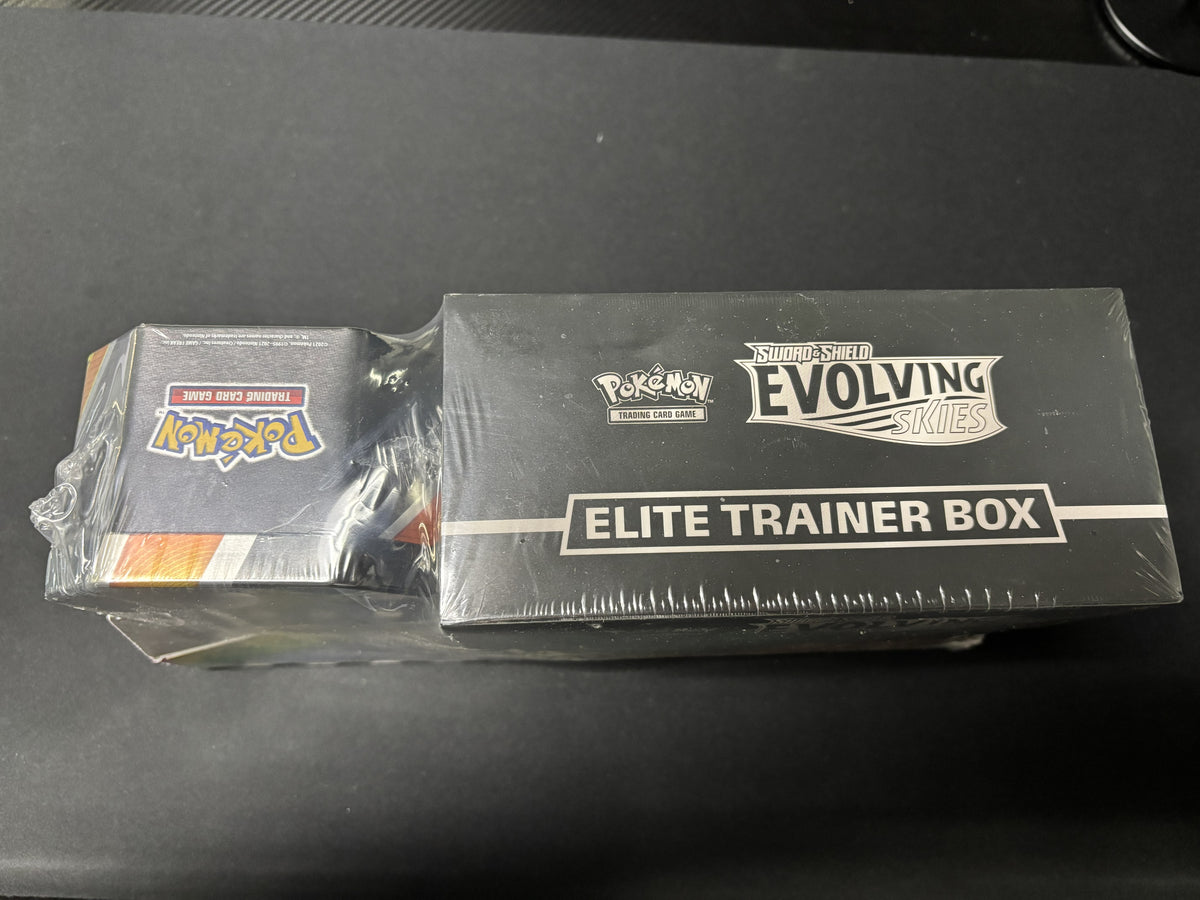 Costco Evolving Skies ETB and Tin Pack